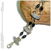 Silver Bracelet with Marquise Shaped Natural Iolite Cabs and Natural Rainbow Moonstone Cabs 